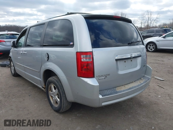 2010 Dodge Grand Caravan SXT with VIN 2D4RN5D13AR180609, listed as a IAAI auction lot 41857215 with Not Provided miles and . Bid and sale history available at DreamBid. Image 3.