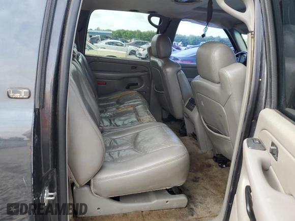 2006 Chevrolet Suburban LS z VIN 1GNFK16Z76J100509, wystawiony jako Copart lot #54568635 z przebiegiem 264 879 mil mil oraz Szkoda całkowita • Salvage title. Historia ofert i sprzedaży dostępna na DreamBid. Obrazek 11.