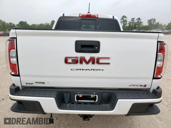 2022 GMC Canyon 4WD AT4 z VIN 1GTG6FEN2N1210072, wystawiony jako Copart lot #57084565 z przebiegiem 64 897 mil mil oraz Szkoda całkowita • Salvage title. Historia ofert i sprzedaży dostępna na DreamBid. Obrazek 6.