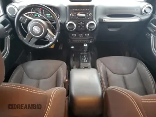 2015 Jeep Wrangler Unlimited Sahara with VIN 1C4BJWEGXFL606573, listed as a Copart auction lot 83983894 with 103,314 mi miles and Clean title. Bid and sale history available at DreamBid. Image 8.