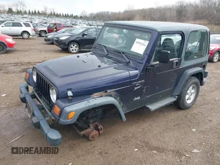 1999 Jeep Wrangler Sport with VIN 1J4FY19S9XP419330, listed as a IAAI auction lot 41913314 with 167,176 mi miles. Bid and sale history available at carsss.com. Image 2.