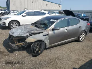 2013 Kia Optima EX z VIN 5XXGN4A74DG196662, wystawiony jako Copart lot #62426165 z przebiegiem Nie podano mil oraz Szkoda całkowita • Salvage title. Historia ofert i sprzedaży dostępna na DreamBid. Obrazek 1.
