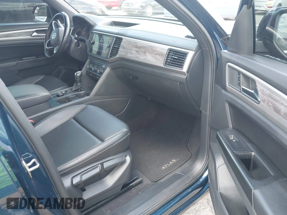 2020 Volkswagen Atlas with VIN 1V21C2CAXLC213034, listed as a IAAI auction lot 42649872 with 72,564 mi miles and . Bid and sale history available at DreamBid. Image 5.