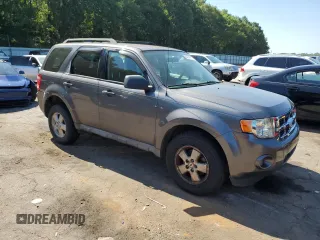 2009 Ford Escape XLS with VIN 1FMCU02749KA36136, listed as a Copart auction lot 64941875 with 171,576 mi miles and Clean title. Bid and sale history available at DreamBid. Image 4.