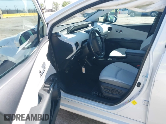 2021 Toyota Prius LE with VIN JTDKAMFP2M3177459, listed as a IAAI auction lot 42093828 with 65,501 mi miles and . Bid and sale history available at DreamBid. Image 5.