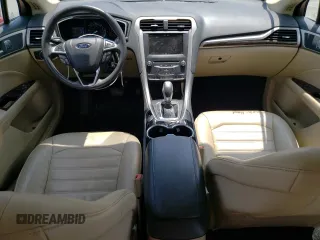 2014 Ford Fusion SE Hybrid with VIN 3FA6P0LU3ER253735, listed as a Copart auction lot 63222635 with 147,470 mi miles and Salvage title. Bid and sale history available at DreamBid. Image 8.