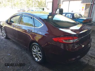 2017 Ford Fusion SE z VIN 3FA6P0HD2HR122650, wystawiony jako IAAI lot #41965411 z przebiegiem 107 227 mil mil oraz . Historia ofert i sprzedaży dostępna na DreamBid. Obrazek 3.
