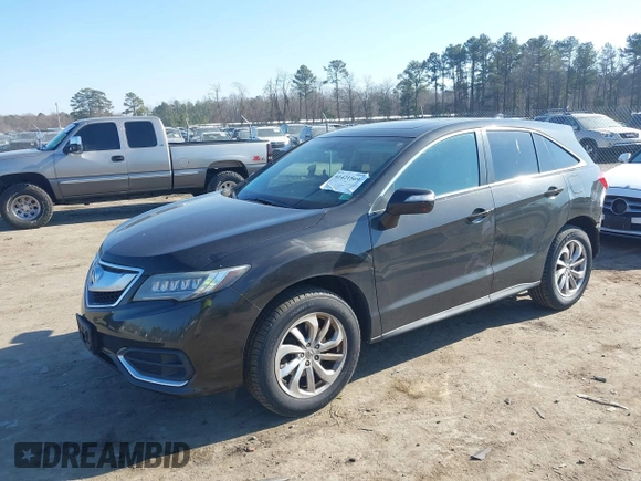 2016 Acura RDX with VIN 5J8TB4H36GL011656, listed as a IAAI auction lot 41421569 with 128,005 mi miles. Bid and sale history available at carsss.com. Image 2.