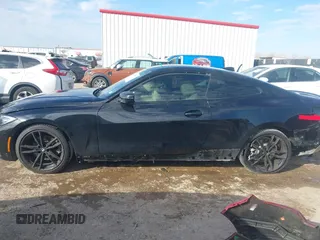 2022 BMW 4 Series 430i with VIN WBA53AP09NCJ24098, listed as a IAAI auction lot 41395007 with 34,062 mi miles and . Bid and sale history available at carsss.com. Image 15.