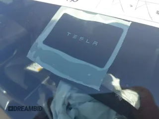 2021 Tesla Model 3 Long Range with VIN 5YJ3E1EB1MF071634, listed as a IAAI auction lot 41964321 with 39,596 mi miles. Bid and sale history available at carsss.com. Image 11.
