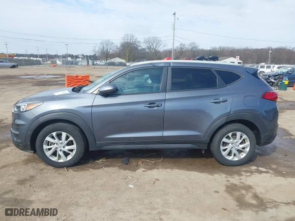 2019 Hyundai Tucson Value with VIN KM8J33A40KU999340, listed as a IAAI auction lot 41876380 with 52,752 mi miles. Bid and sale history available at carsss.com. Image 14.