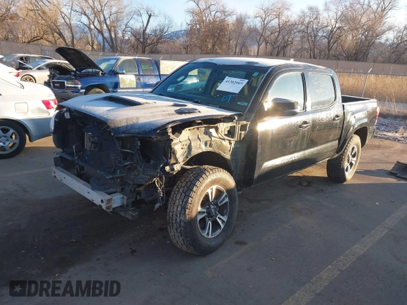 2016 Toyota Tacoma SR with VIN 3TMCZ5AN0GM023263, listed as a IAAI auction lot 41302069 with 137,276 mi miles and . Bid and sale history available at DreamBid. Image 21.
