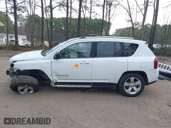 2014 Jeep Compass Sport with VIN 1C4NJCBB9ED547335, listed as a IAAI auction lot 41821726 with 144,100 mi miles and . Bid and sale history available at DreamBid. Image 15.