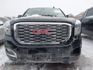 2020 GMC Yukon Denali with VIN 1GKS2CKJ5LR301216, listed as a IAAI auction lot 41439076 with 76,129 mi miles. Bid and sale history available at carsss.com. Image 12.