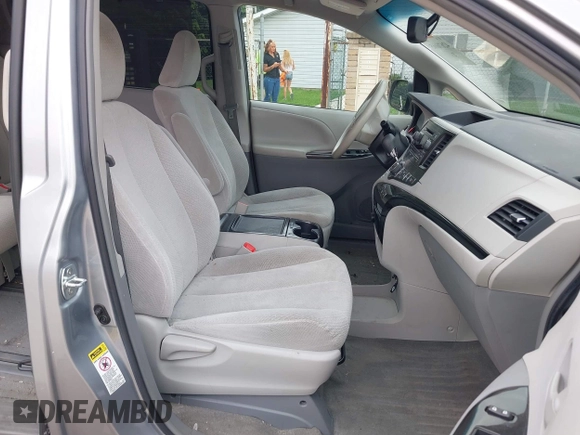 2013 Toyota Sienna LE AAS with VIN 5TDKK3DC7DS332092, listed as a IAAI auction lot 42676665 with 121,481 mi miles and . Bid and sale history available at DreamBid. Image 5.
