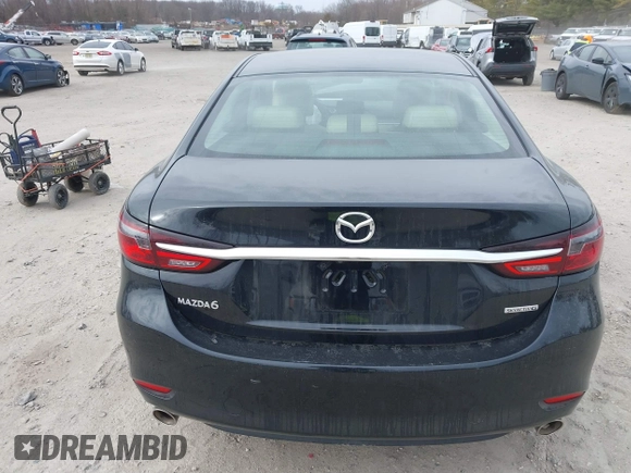 2021 Mazda Mazda6 Touring with VIN JM1GL1VM1M1604566, listed as a IAAI auction lot 41728787 with 68,636 mi miles. Bid and sale history available at carsss.com. Image 16.