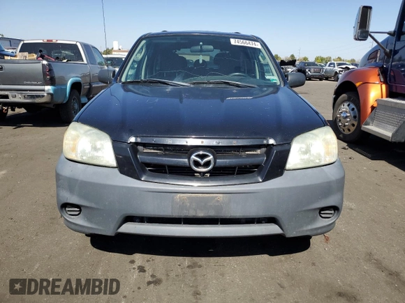 2006 Mazda Tribute i with VIN 4F2YZ02Z16KM36535, listed as a Copart auction lot 74566474 with 254,105 mi miles and Clean Title. Bid and sale history available at carsss.com. Image 5.