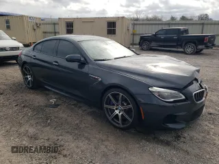 2016 BMW M6 z VIN WBS6E9C59GG437111, wystawiony jako Copart lot #44711734 z przebiegiem 79 471 mil mil oraz . Historia ofert i sprzedaży dostępna na DreamBid. Obrazek 4.