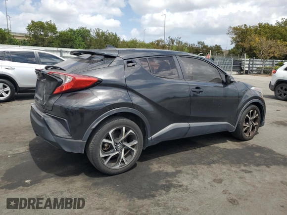 2018 Toyota C-HR XLE with VIN NMTKHMBX1JR015428, listed as a Copart auction lot 51111425 with 95,500 mi miles and Salvage Title. Bid and sale history available at carsss.com. Image 3.