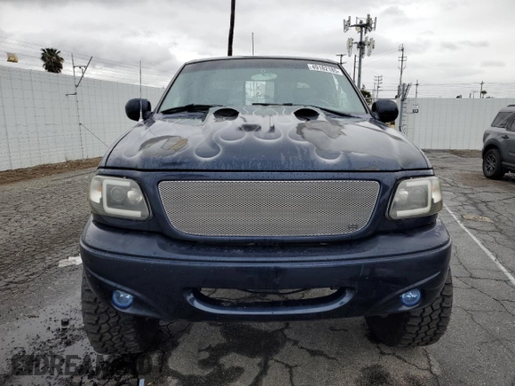 2002 Ford F-150 с VIN 1FTPX17L02NA71656, выставлен на аукционе Copart как лот 49182185 с пробегом 49 745 миль миль и Списание • Salvage title. История ставок и продаж доступна на DreamBid. Изображение 5.