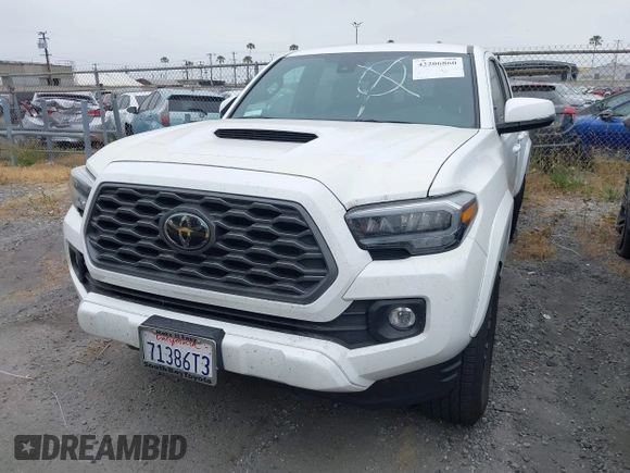2023 Toyota Tacoma SR5 z VIN 3TMAZ5CNXPM208862, wystawiony jako IAAI lot #42206860 z przebiegiem 11 354 mil mil oraz . Historia ofert i sprzedaży dostępna na DreamBid. Obrazek 13.