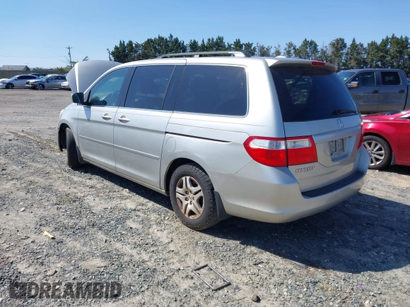 2007 Honda Odyssey EX-L with VIN 5FNRL387X7B080906, listed as a IAAI auction lot 41910061 with 229,717 mi miles and . Bid and sale history available at DreamBid. Image 3.