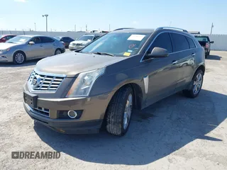 2015 Cadillac SRX Performance Collection with VIN 3GYFNCE31FS598109, listed as a IAAI auction lot 41788267 with 172,488 mi miles and . Bid and sale history available at DreamBid. Image 17.