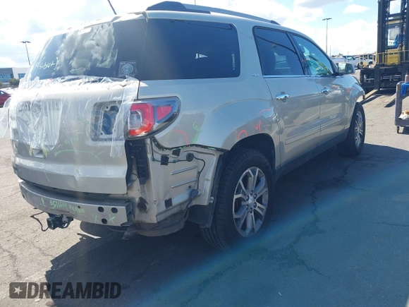 2014 GMC Acadia SLT z VIN 1GKKRSKD2EJ141913, wystawiony jako IAAI lot #41738536 z przebiegiem 100 577 mil mil oraz . Historia ofert i sprzedaży dostępna na DreamBid. Obrazek 4.