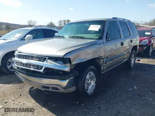 2003 Chevrolet Tahoe LS with VIN 1GNEC13V13J298445, listed as a IAAI auction lot 41728848 with 226,727 mi miles. Bid and sale history available at carsss.com. Image 2.