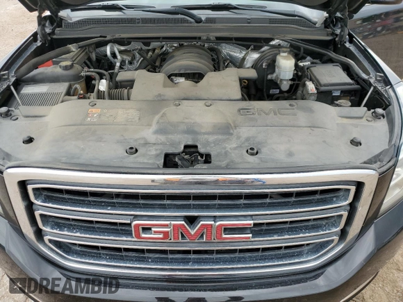 2015 GMC Yukon SLE with VIN 1GKS2AKC3FR120819, listed as a Copart auction lot 63354434 with 115,669 mi miles and Clean Title. Bid and sale history available at carsss.com. Image 12.