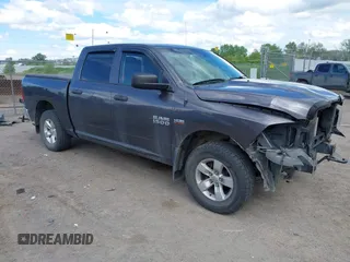 2014 Ram 1500 Express with VIN 1C6RR7KT4ES295300, listed as a IAAI auction lot 42294168 with 104,963 mi miles and . Bid and sale history available at DreamBid. Image 1.