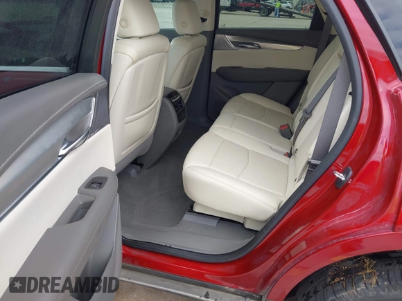 2020 Cadillac XT5 Premium Luxury FWD z VIN 1GYKNCRS8LZ228516, wystawiony jako IAAI lot #42409513 z przebiegiem 54 765 mil mil oraz . Historia ofert i sprzedaży dostępna na DreamBid. Obrazek 8.