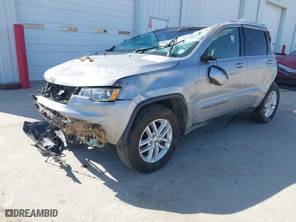 2018 Jeep Grand Cherokee Laredo E with VIN 1C4RJFAG8JC130465, listed as a IAAI auction lot 41789688 with 133,299 mi miles. Bid and sale history available at carsss.com. Image 18.