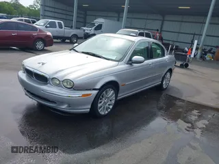 2003 Jaguar X-Type 2.5L Manual with VIN SAJEA51D33XC93300, listed as a IAAI auction lot 42048118 with 116,939 mi miles and . Bid and sale history available at DreamBid. Image 2.