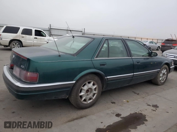 1997 Cadillac Seville Luxury SLS with VIN 1G6KS52YXVU816137, listed as a Copart auction lot 85664104 with 161,553 mi miles and Salvage Title. Bid and sale history available at carsss.com. Image 3.