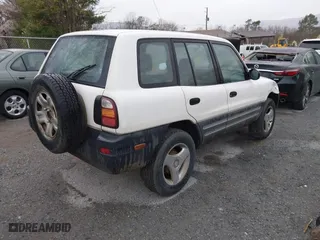 1999 Toyota RAV4 with VIN JT3HP10VXX7115145, listed as a IAAI auction lot 41853011 with 211,121 mi miles. Bid and sale history available at carsss.com. Image 4.