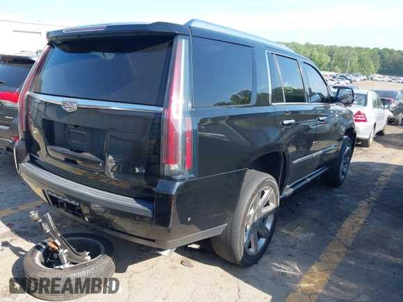 2017 Cadillac Escalade Premium Luxury with VIN 1GYS3CKJ2HR121993, listed as a IAAI auction lot 42172777 with 157,494 mi miles and . Bid and sale history available at DreamBid. Image 4.