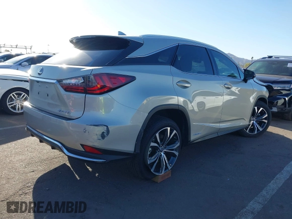2021 Lexus RX 450h with VIN 2T2HGMDA0MC067228, listed as a IAAI auction lot 41818836 with 28,850 mi miles and . Bid and sale history available at DreamBid. Image 4.