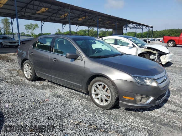 2012 Ford Fusion SEL with VIN 3FAHP0JA7CR387288, listed as a Copart auction lot 56968885 with 169,802 mi miles and Salvage title. Bid and sale history available at DreamBid. Image 4.