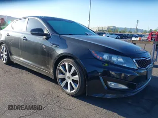 2012 Kia Optima SX z VIN 5XXGR4A67CG028122, wystawiony jako IAAI lot #42215655 z przebiegiem 168 223 mil mil oraz . Historia ofert i sprzedaży dostępna na DreamBid. Obrazek 1.