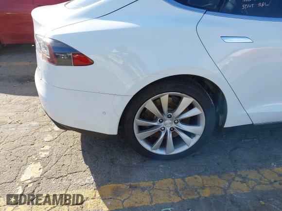 2014 Tesla Model S 60 with VIN 5YJSA1H13EFP62451, listed as a IAAI auction lot 41639068 with 88,000 mi miles and . Bid and sale history available at DreamBid. Image 6.