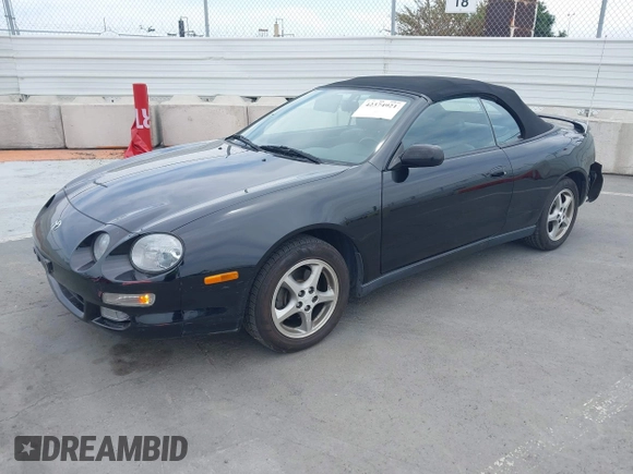 1999 Toyota Celica GT z VIN JT5FG02T9X0056800, wystawiony jako IAAI lot #42374921 z przebiegiem 48 157 mil mil oraz . Historia ofert i sprzedaży dostępna na DreamBid. Obrazek 2.