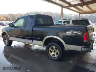 2000 Ford F-150 XL with VIN 1FTRX18LXYNA19385, listed as a IAAI auction lot 41075391 with 214,624 mi miles. Bid and sale history available at carsss.com. Image 3.