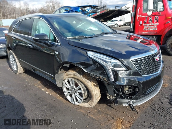 2020 Cadillac XT5 Premium Luxury AWD with VIN 1GYKNDRS2LZ183191, listed as a IAAI auction lot 41217033 with 87,307 mi miles. Bid and sale history available at carsss.com. Image 1.