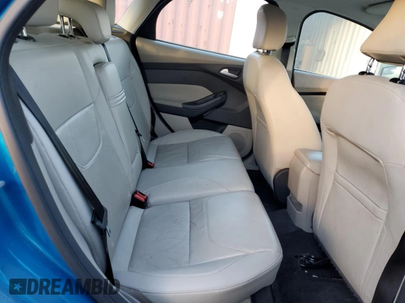 2015 Ford Focus Electric z VIN 1FADP3R44FL358378, wystawiony jako Copart lot #87859715 z przebiegiem Nie podano mil oraz Szkoda całkowita • Salvage title. Historia ofert i sprzedaży dostępna na DreamBid. Obrazek 10.