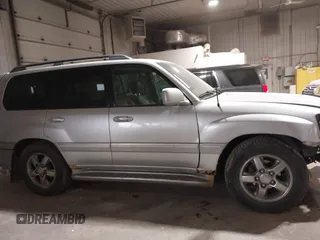 2007 Toyota Land Cruiser z VIN JTEHT05J972108283, wystawiony jako IAAI lot #41476536 z przebiegiem 212 693 mil mil oraz . Historia ofert i sprzedaży dostępna na DreamBid. Obrazek 13.