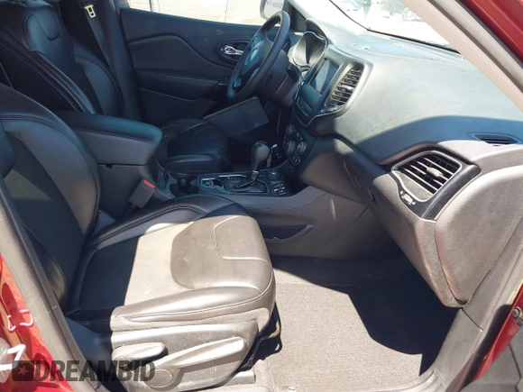 2019 Jeep Cherokee Latitude Plus with VIN 1C4PJMLB7KD384984, listed as a IAAI auction lot 42243845 with 60,914 mi miles and . Bid and sale history available at DreamBid. Image 5.