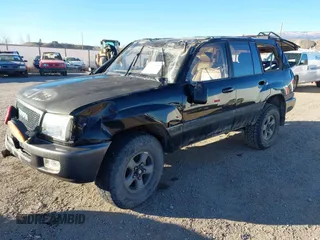 1999 Toyota Land Cruiser with VIN JT3HT05J5X0030492, listed as a IAAI auction lot 41331686 with 1 mi miles. Bid and sale history available at carsss.com. Image 2.