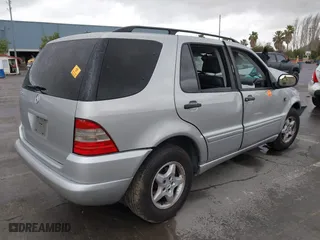 2001 Mercedes-Benz M-Class with VIN 4JGAB54E61A237617, listed as a IAAI auction lot 41788348 with 178,752 mi miles. Bid and sale history available at carsss.com. Image 4.