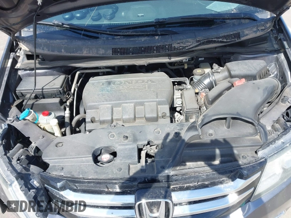 2014 Honda Odyssey Touring with VIN 5FNRL5H91EB093540, listed as a IAAI auction lot 41887412 with 202,076 mi miles and . Bid and sale history available at DreamBid. Image 10.